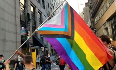 Philadelphians celebrate the outcome of 2020’s presidential election, waving the Progress Pride Flag while marching through Center City.