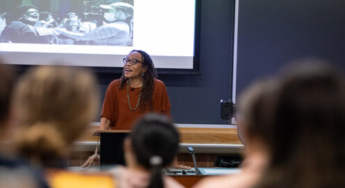 Professor Dorothy Roberts speaks to a lecture hall of students