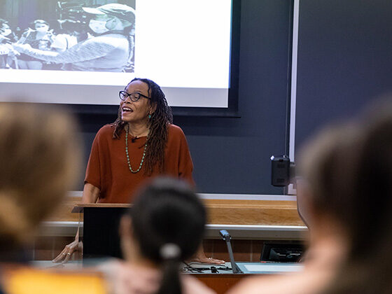 Professor Dorothy Roberts speaks to a lecture hall of students
